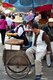 China: Peanut vendor near the Bird and Flower Market in the Old Muslim Quarter on Jingxing Road off Zheng Yi Road, Kunming, Yunnan Province